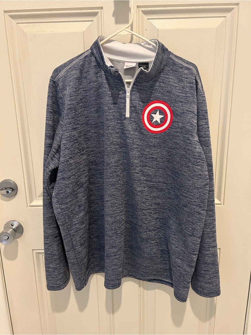Marvel women’s Heather Navy Quarter-Zip Sweatshirt with Captain Shield Patch